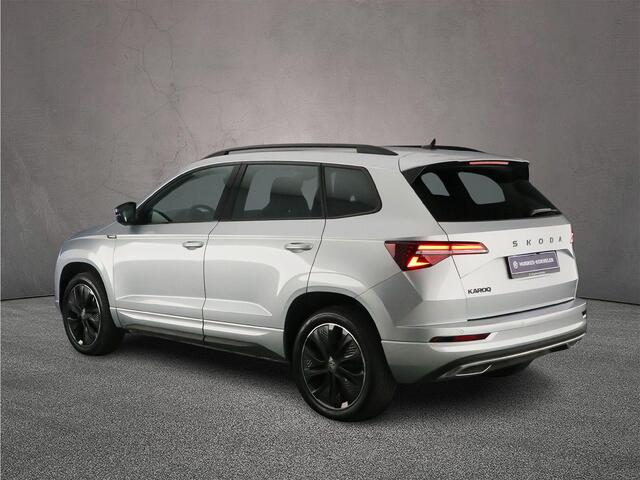 Skoda Karoq Sportline Business 1.5 TSI 150pk DSG Automaat Trekhaak, Adaptive cruise control, Achteruitrijcamera, Navigatie, Elektrische achterklep, LED matrix koplampen
