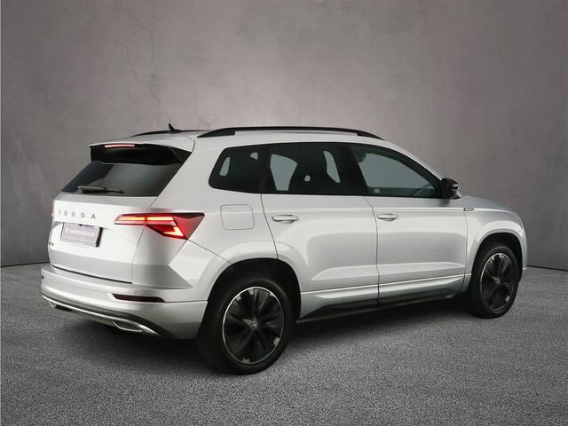 Skoda Karoq Sportline Business 1.5 TSI 150pk DSG Automaat Trekhaak, Adaptive cruise control, Achteruitrijcamera, Navigatie, Elektrische achterklep, LED matrix koplampen