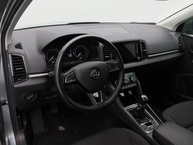 Skoda Karoq 1.5 TSi ACT Ambition 150 Pk | Wegklapbare Trekhaak | Camera | Navigatie | CarPlay | Stoelverwarming | 17 Inch