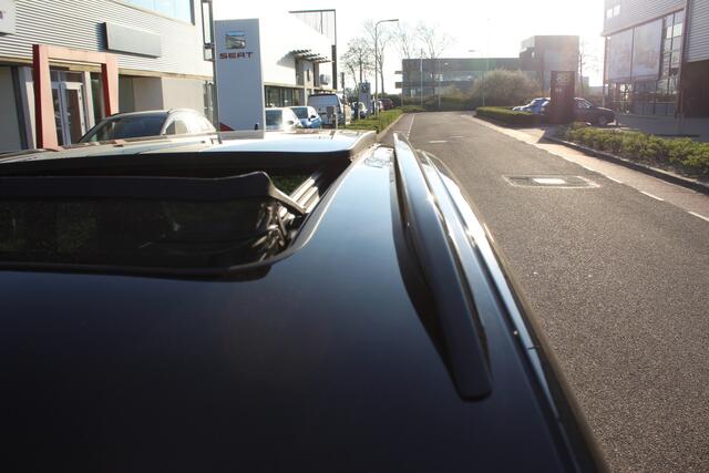 Skoda Karoq 1.5 TSI ACT Sportline Business / PANODAK / NAVI/ APP.Connect / Elektr. Trekhaak / CAMERA / 19"LMV