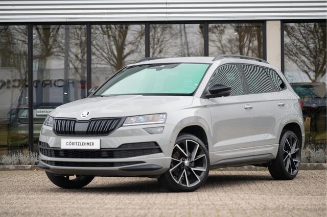 Skoda Karoq 1.5 TSI ACT Sportline Business | Trekhaak | Adapt. Cruise | Camera | 19" | Winterpakket
