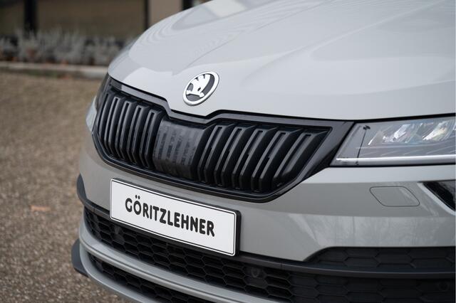 Skoda Karoq 1.5 TSI ACT Sportline Business | Trekhaak | Adapt. Cruise | Camera | 19" | Winterpakket