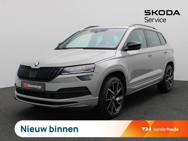 Skoda Karoq 1.5 TSI ACT Sportline Business 150PK DSG Trekhaak, Canton Audio, 19" LM Velgen, Elektr. Achterklep, Keyless, Adaptieve Cruise Controle, Achteruitrijcamera, Side Assist, Stoelverwarming, Voorruitverwarming