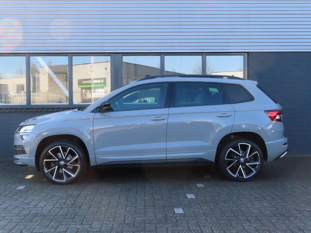Skoda Karoq 1.5 TSI ACT Sportline Business DSG | pano dak | wegklapbare trekhaak | groot navi | voorstoelen + achterbank verwarmd | voorrruitverwarming