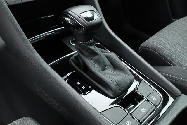 Skoda Karoq 1.5 TSI ACT Style DSG | Navi | Adapt. Cruise | Camera | Keyless | All Season | Apple CarPlay | Stoelverw.