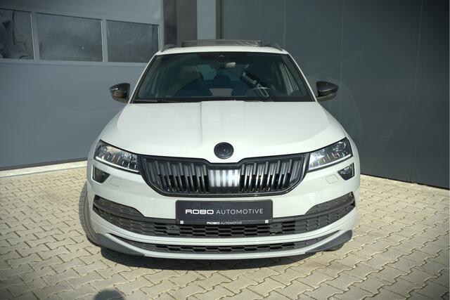 Skoda Karoq 1.5 TSI ACT Sportline Business | Panoramadak | Stoelverwarming | Stuurverwarming | Canton | Keyless | Apple Carplay | Camera | Adaptive Cruise Control | Dodehoekdetectie