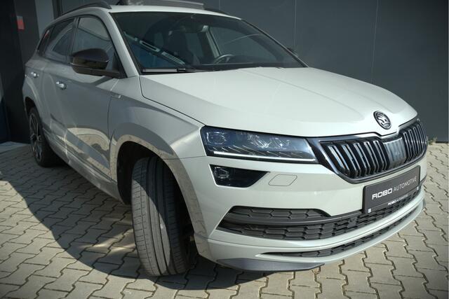 Skoda Karoq 1.5 TSI ACT Sportline Business | Panoramadak | Stoelverwarming | Stuurverwarming | Canton | Keyless | Apple Carplay | Camera | Adaptive Cruise Control | Dodehoekdetectie