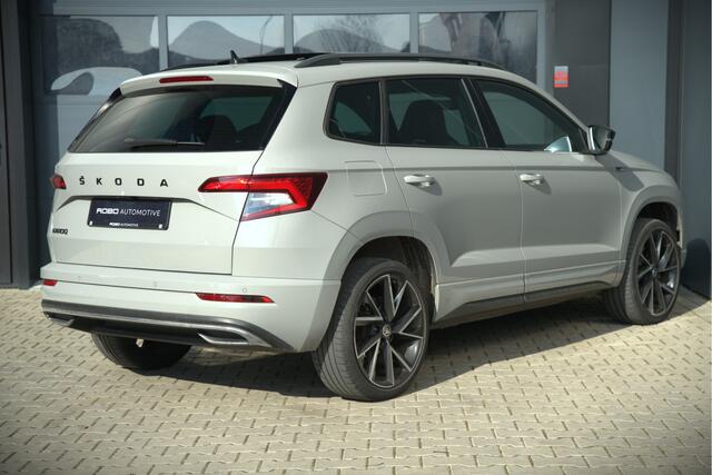 Skoda Karoq 1.5 TSI ACT Sportline Business | Panoramadak | Stoelverwarming | Stuurverwarming | Canton | Keyless | Apple Carplay | Camera | Adaptive Cruise Control | Dodehoekdetectie