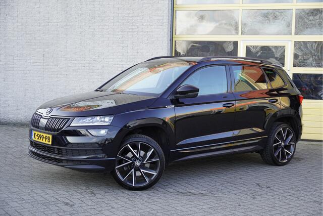 Skoda Karoq 150PK! Automaat Sportline Business BJ2021 | Lmv 19" | Led V+A | Keyless entry | Pdc V+A | Panoramadak | Elek. trekhaak | Verwarmde voorruit | Achteruitrijcamera | App-Connect | Navi | Virtual cockpit | Voorstoelen verwarmd/stuur