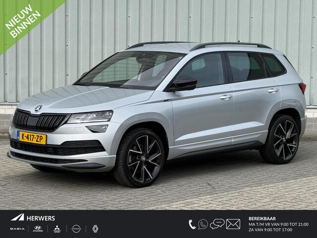 Skoda Karoq 1.5 TSI ACT Sportline Business / Nederlandse Auto / Dealer Onderhouden / All Seasonbanden / Trekhaak 1500 KG / Navigatie / Stoel- en Stuurverwarming / Adaptive Cruise Control / Voorruitverwarming / Climate Control /