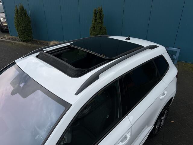 Skoda Karoq 1.5 TSI DSG AUT. Sportline Business PANO | CANTON.AUDIO | CARPLAY | TREKH.ELEK | STUUR/STOELVERW | DIGI.DASHB | ADAPT.CRUISE | CAM | LED | NAV | PDC | LMV
