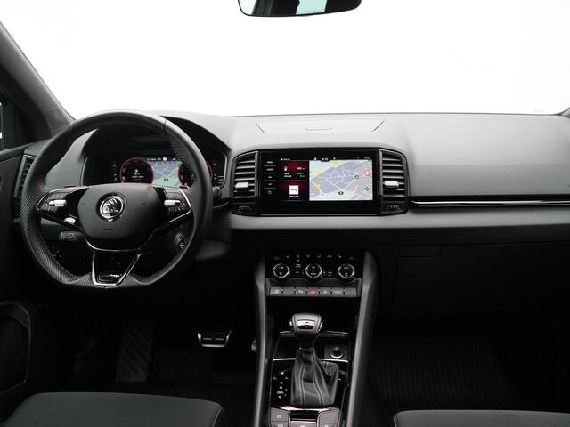Skoda Karoq 1.5 TSI ACT Sportline Business DSG 150pk | Adaptive Cruise | Camera | Matrix LED | RS Sportstoelen Verwarmd | 18"L.M | Adaptive Onderstel | Keyless | Sfeerverlichting | Apple Carplay | Virtual | Navigatie | DAB |