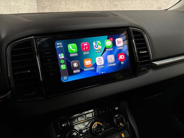 Skoda Karoq 1.0 TSI Sport Automaat (PANORAMADAK, APPLE CARPLAY, GROOT NAVI, CLIMATE, CAMERA, STOELVERWARMING, SPORTSTOELEN, GETINT GLAS, ADAPTIVE CRUISE, NIEUWE APK, NIEUWSTAAT)