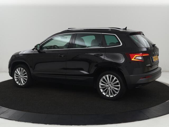 Skoda Karoq 1.5 TSI Business Edition | Panoramadak | Leder | Stoelverwarming | Adaptive cruise | Side Assist | Carplay | Navigatie | Camera | Navigatie | Full LED | Climate control | Parkeerhulp