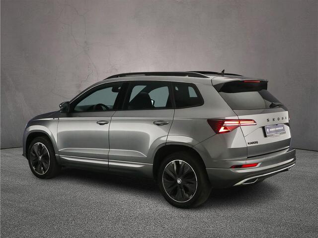 Skoda Karoq Sportline Business 1.5 TSI 150pk DSG Automaat Trekhaak, Panoramadak, Elektrische achterklep, Adaptive cruise control, Navigatie, Achteruitrijcamera,