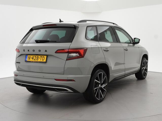 Skoda Karoq 1.5 TSI ACT 150 PK DSG SPORTLINE + CANTON AUDIO | STEEL GREY | CAMERA | 19 INCH | VIRTUAL | SFEER