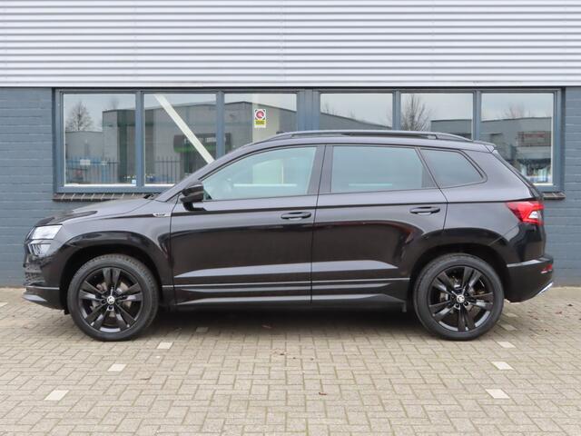 Skoda Karoq 1.5 TSI ACT Sportline Business DSG | pano dak | trekhaak wegklapbaar | canton soundsystem | verwarmbare voorruit |