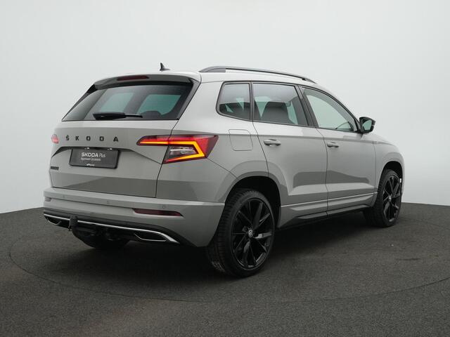 Skoda Karoq 1.5 TSI 150 pk DSG ACT Sportline Business | Trekhaak | Achteruitrijcamera | Adaptive Cruise | Stoelverwarming | Navigatie | Side Assist