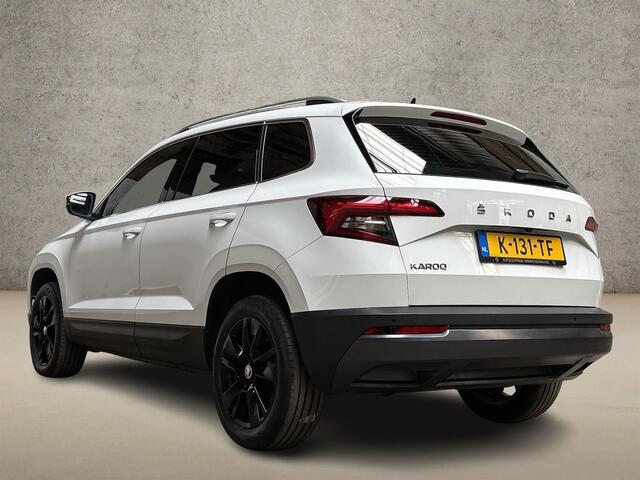 Skoda Karoq 1.5 TSI ACT Deluxe 150Pk Automaat (PANORAMADAK, APPLE CARPLAY, LEDER, ZWART HEMEL, CANTON AUDIO, STOELVERWARMING, ADAPTIVE CRUISE, KEYLESS, GETINT GLAS, CAMERA, NIEUWSTAAT)