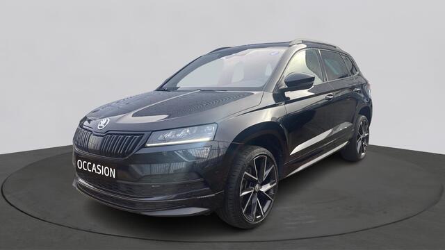 Skoda Karoq 1.5 TSI ACT 150pk DSG Sportline Business Panorama Trekhaak Camera Stoelverwarming Carplay