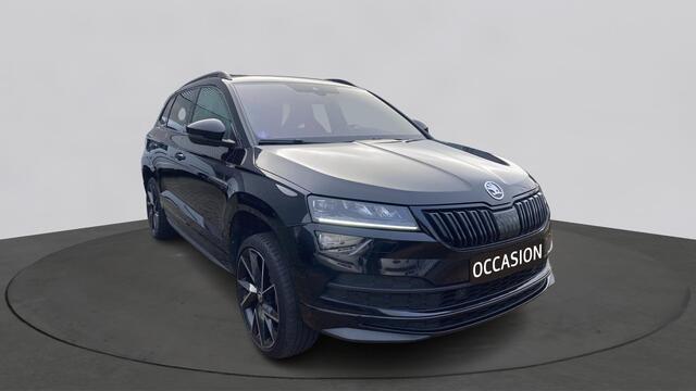 Skoda Karoq 1.5 TSI ACT 150pk DSG Sportline Business Panorama Trekhaak Camera Stoelverwarming Carplay