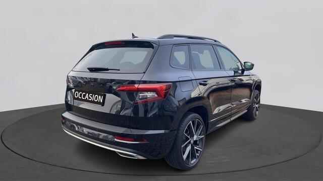 Skoda Karoq 1.5 TSI ACT 150pk DSG Sportline Business Panorama Trekhaak Camera Stoelverwarming Carplay