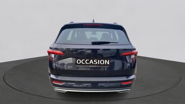 Skoda Karoq 1.5 TSI ACT 150pk DSG Sportline Business Panorama Trekhaak Camera Stoelverwarming Carplay