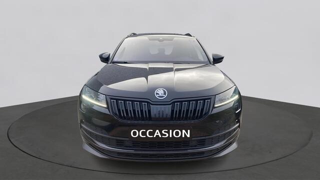 Skoda Karoq 1.5 TSI ACT 150pk DSG Sportline Business Panorama Trekhaak Camera Stoelverwarming Carplay