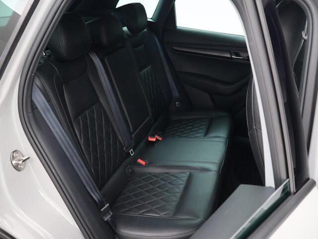 Skoda Karoq 1.5 TSI ACT SPORTLINE + WEGKL. TREKHAAK | VOL LEDER | ADAPTIVE CRUISE | CANTON | CAMERA
