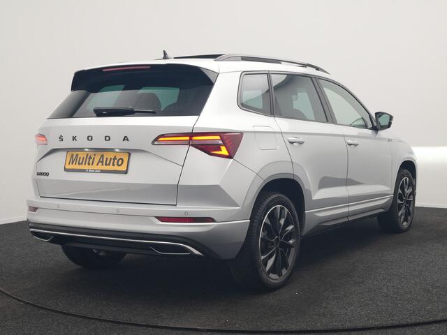Skoda Karoq 1.5 TSI ACT Sportline Facelift Model 150pk DSG Dealer O.H | Trekhaak Af Fabriek | Adaptive Cruise | Crystal LED | Lederen Sportstoelen Memory & Verwarmd | Keyless | Sfeerverlichting | Apple Carplay | Verwarmd Sportstuur | Navigatie | Virtual | DAB |