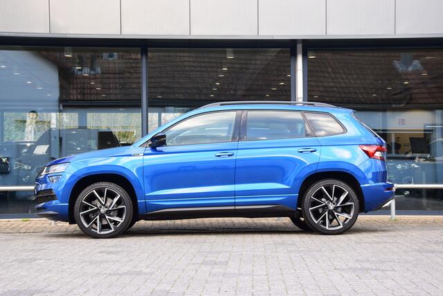 Skoda Karoq 1.5 TSI ACT Sportline Business | Incl. BOVAG Garantie | Geen import | Trekhaak | Apple Carplay/Android Auto | PDC Voor+Achter | Stoel&Stuurverwarming | 19'' Velgen | Full LED |