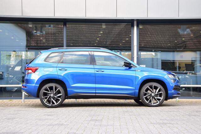 Skoda Karoq 1.5 TSI ACT Sportline Business | Incl. BOVAG Garantie | Geen import | Trekhaak | Apple Carplay/Android Auto | PDC Voor+Achter | Stoel&Stuurverwarming | 19'' Velgen | Full LED |