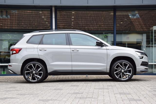 Skoda Karoq 1.5 TSI 150PK ACT Sportline Business DSG Automaat | Org. NL | Rijklaar incl. BOVAG Garantie | Trekhaak | 19'' Velgen | Virtual Cockpit | Achteruitrijcamera | Stoel/Stuur&Voorruitverwarming |