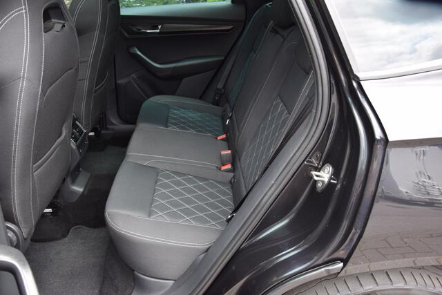 Skoda Karoq 2.0 TSI 4x4 Sportline Business DSG Automaat | BOVAG Garantie | Unieke Auto! | Trekhaak | Panoramadak | Camera | Adaptive Cruise Control | 19'' Velgen | Stoelverwarming | Canton |