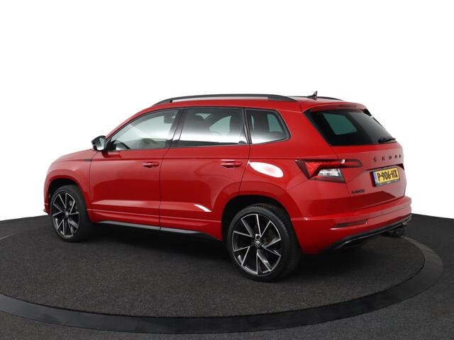 Skoda Karoq 1.5 TSI ACT Sportline Business | Trekhaak | Stoelverwarming | All Season Banden | Navigatie |