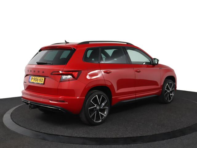 Skoda Karoq 1.5 TSI ACT Sportline Business | Trekhaak | Stoelverwarming | All Season Banden | Navigatie |