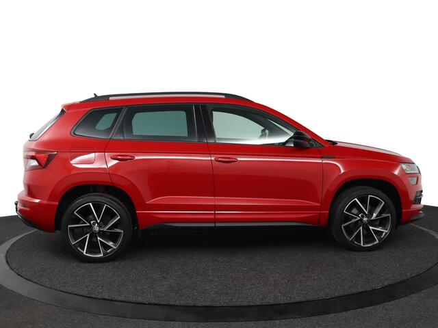 Skoda Karoq 1.5 TSI ACT Sportline Business | Trekhaak | Stoelverwarming | All Season Banden | Navigatie |