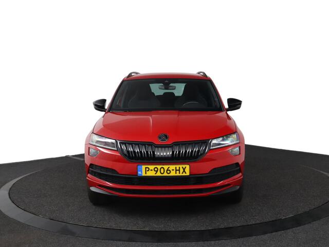 Skoda Karoq 1.5 TSI ACT Sportline Business | Trekhaak | Stoelverwarming | All Season Banden | Navigatie |