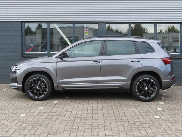 Skoda Karoq 1.5 TSI ACT Sportline Business | trekhaak wegklapbaar | verwarmbare voorruit | DCC | voorstoelen + achterbank verwarmd