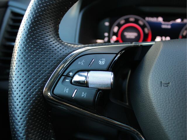 Skoda Karoq 1.5 TSI ACT Sportline Business Automaat /NAVI/PDC/Camera/CANTON/LED/19'LM/Virtual Cockpit/Carplay/Keyless/NAP! 1e eig!