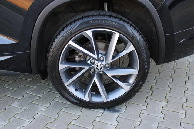 Skoda Kodiaq 1.5 TSI Sportline Business | Incl. 12 maanden garantie | Wegklapbare trekhaak | Apple CarPlay | Canton audio | Adaptive cruise | Stoelverwarming | Achteruitrij camera | Parkeersensoren |