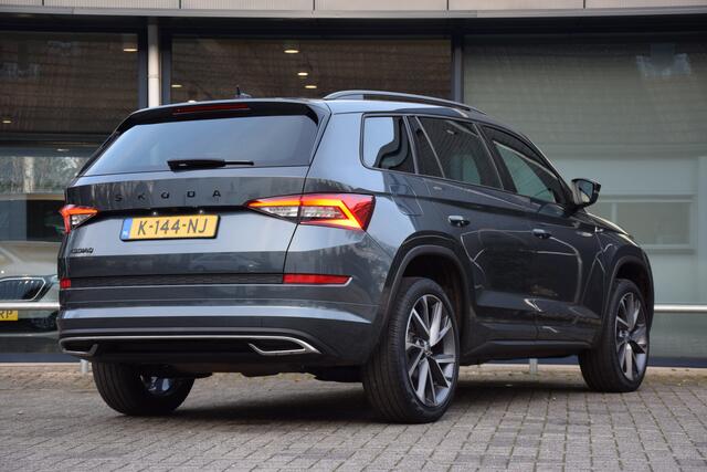Skoda Kodiaq 1.5 TSI 150PK DSG Automaat Sportline Business | Org. NL | BOVAG Garantie | Trekhaak | Comfort pakket (adaptive cruise control met front assist, verwarmbare voorstoelen) | Panoramadak | Parkeer camera | Virtual dashboard | Stoelverwarming