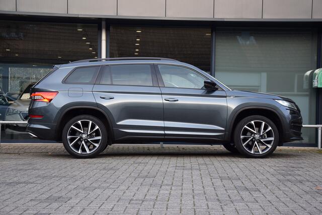 Skoda Kodiaq 1.5 TSI 150PK DSG Automaat Sportline Business | Org. NL | BOVAG Garantie | Trekhaak | Comfort pakket (adaptive cruise control met front assist, verwarmbare voorstoelen) | Panoramadak | Parkeer camera | Virtual dashboard | Stoelverwarming