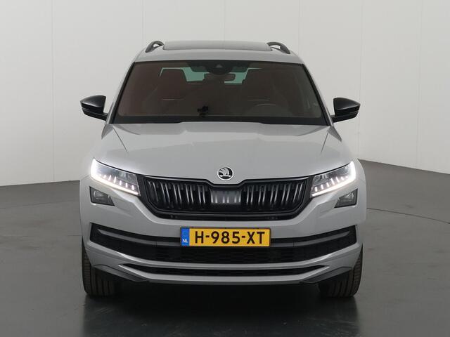 Skoda Kodiaq 1.5 TSI Sportline Business | Trekhaak | Panoramadak | Cruise Control Adaptief | Canton Sound | Parkeercamera | LED | Stoelverwarming voor & achter | Apple Carplay/Android Auto | Keyless Entry/Go |