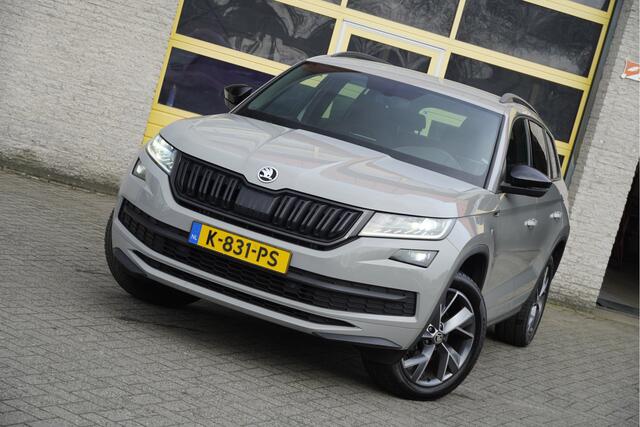 Skoda Kodiaq 1.5 TSI 150PK! Automaat Sportline Business BJ2021 Lmv 19" | Led V+A | Pdc | Keyless entry | Elek. trekhaak | Achteruitrijcamera | App-Connect | Navi | Virtual cockpit | Dashboard verlichting | Elek. Be stoel+Mem | Verwarmde voorstoelen | Zwarte hemel