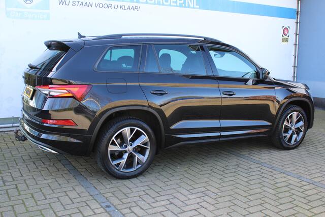 Skoda Kodiaq 1.5 TSI Sportline Business 7p. | Incl. 12 maanden Garantie | Wegklapbare trekhaak | Elektrisch verstelb. bestuurdersstoel met geheugen | Elektrisch kofferbakklep | Apple CarPlay | Adaptive cruise | Stoel/stuur verwarming | Achteruitrij camera | Parkeersen