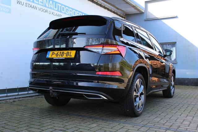 Skoda Kodiaq 1.5 TSI Sportline Business 7p. | Incl. 12 maanden Garantie | Wegklapbare trekhaak | Elektrisch verstelb. bestuurdersstoel met geheugen | Elektrisch kofferbakklep | Apple CarPlay | Adaptive cruise | Stoel/stuur verwarming | Achteruitrij camera | Parkeersen
