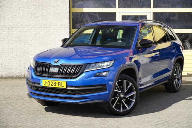 Skoda Kodiaq 1.5 TSI 150PK! Automaat Sportline Business BJ2020 Lmv 20" | Led V+A | Pdc | Keyless entry | Trekhaak afneembaar | Elek. achterklep | Achteruitrijcamera | App-Connect | Navi | Virtual cockpit | Dashboard verlichting | Sportstoelen/Sportstuur | Zwarte hemel