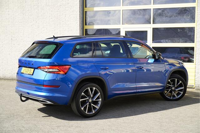 Skoda Kodiaq 1.5 TSI 150PK! Automaat Sportline Business BJ2020 Lmv 20" | Led V+A | Pdc | Keyless entry | Trekhaak afneembaar | Elek. achterklep | Achteruitrijcamera | App-Connect | Navi | Virtual cockpit | Dashboard verlichting | Sportstoelen/Sportstuur | Zwarte hemel