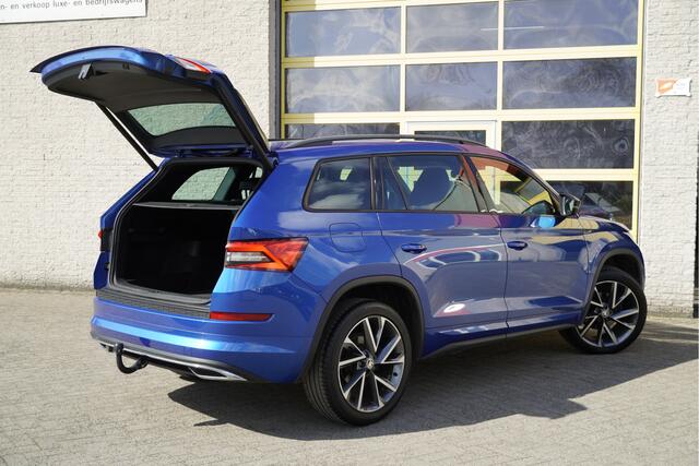 Skoda Kodiaq 1.5 TSI 150PK! Automaat Sportline Business BJ2020 Lmv 20" | Led V+A | Pdc | Keyless entry | Trekhaak afneembaar | Elek. achterklep | Achteruitrijcamera | App-Connect | Navi | Virtual cockpit | Dashboard verlichting | Sportstoelen/Sportstuur | Zwarte hemel